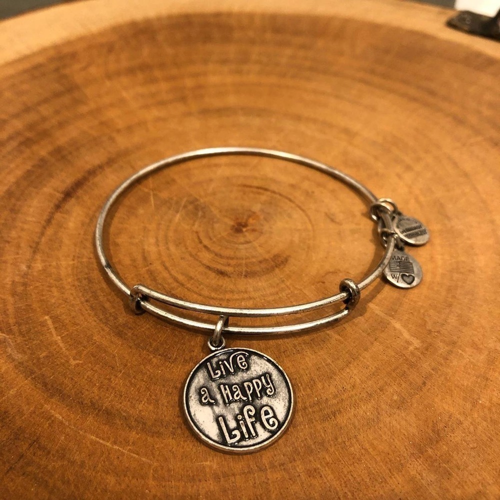 Alex and Ani sliver bangle with a Happy charm!